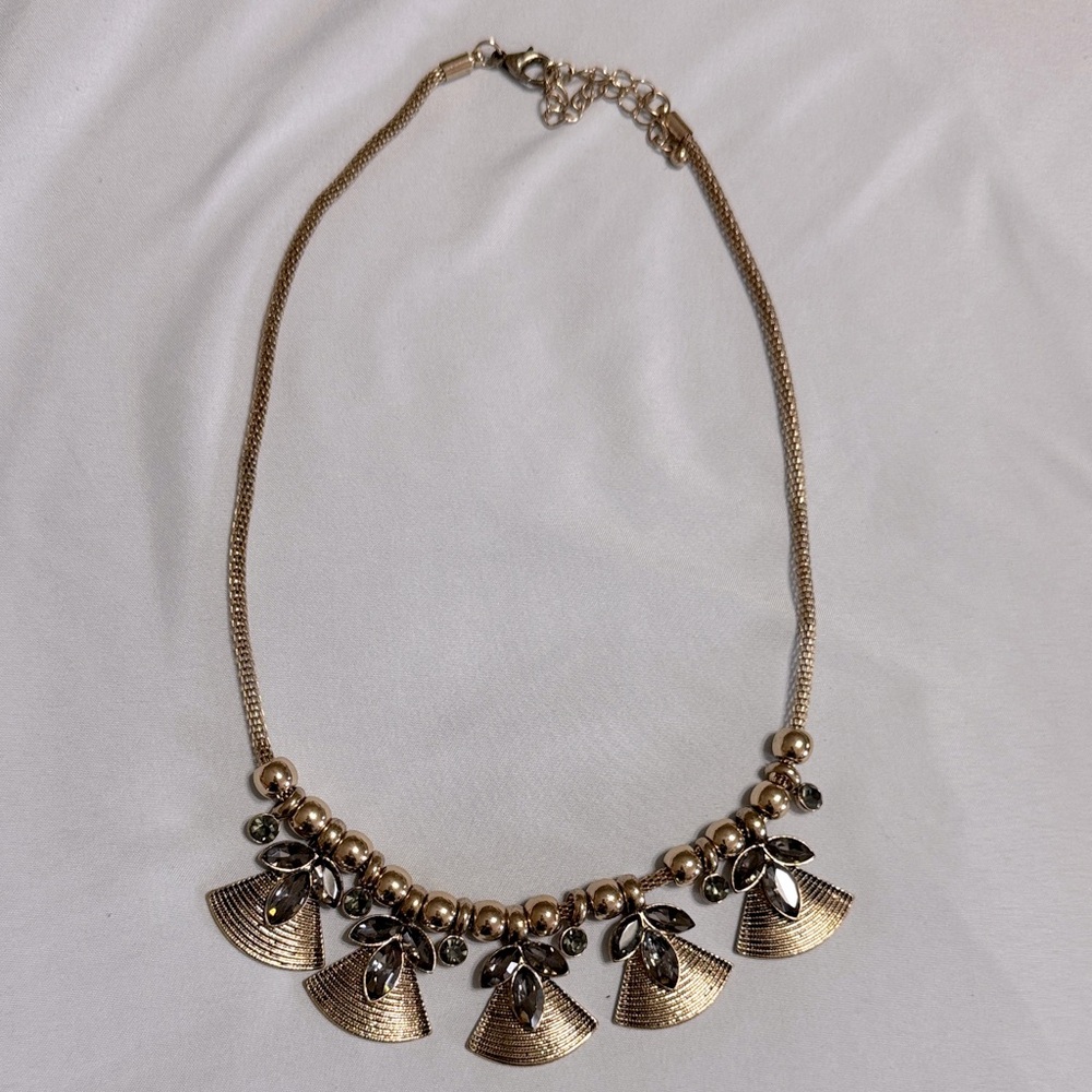 Beautiful gray gem and gold statement necklace